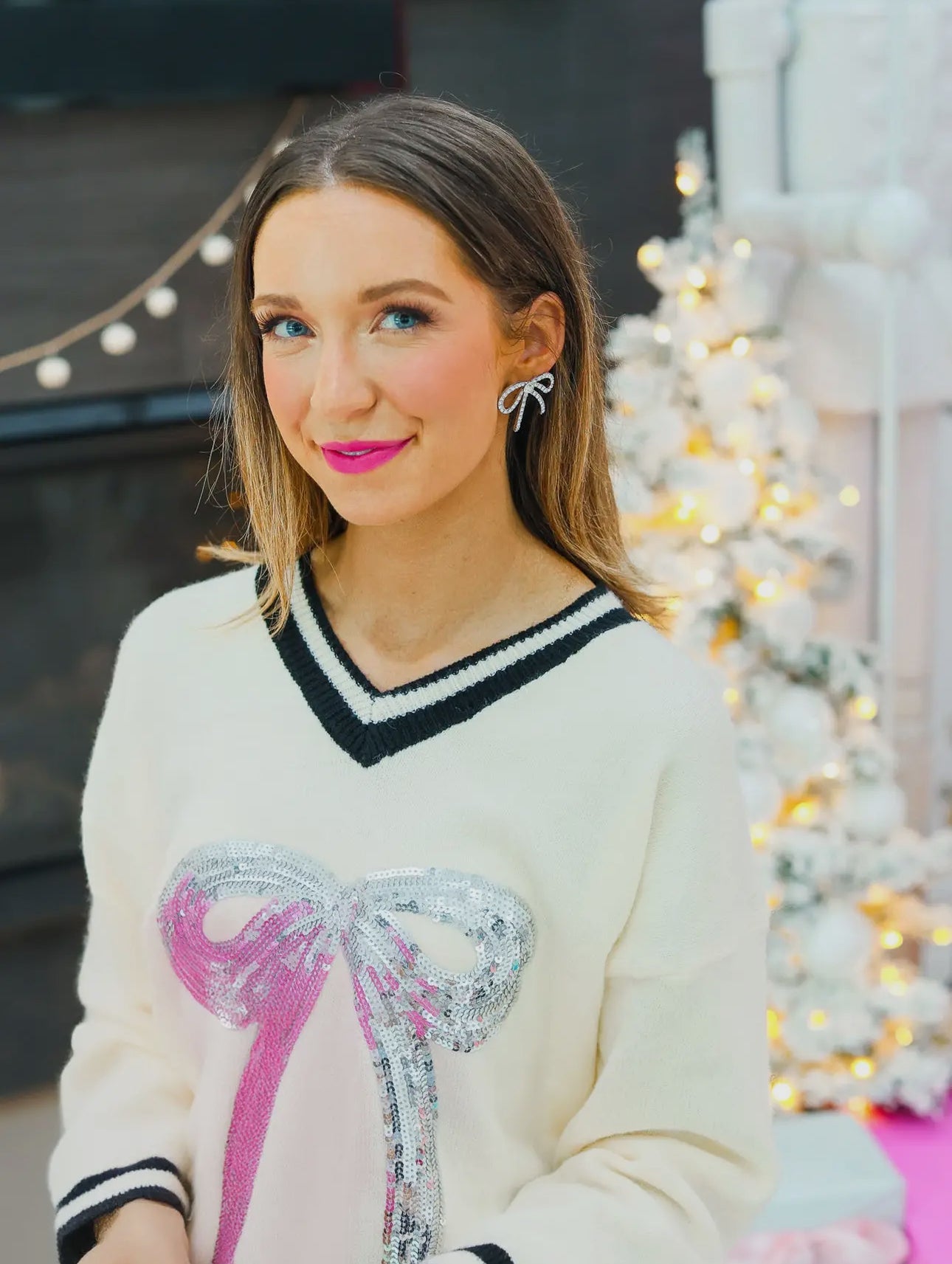 SILVER SEQUIN BOW SWEATER